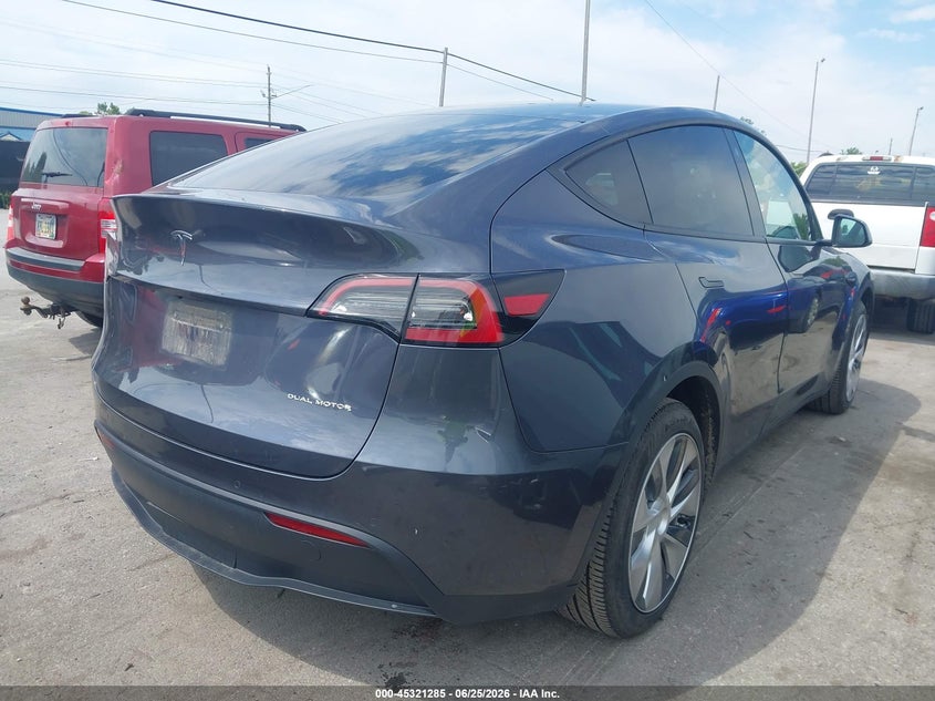 2022 Tesla Model y VIN 7SAYGAEE0NF377366 IAAI salvage auction — HAIL, Salvage (Ohio), sold $12,500 on 2026-07-21 (photo 4)
