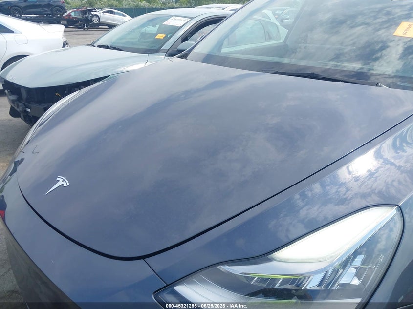 2022 Tesla Model y VIN 7SAYGAEE0NF377366 IAAI salvage auction — HAIL, Salvage (Ohio), sold $12,500 on 2026-07-21 (photo 6)