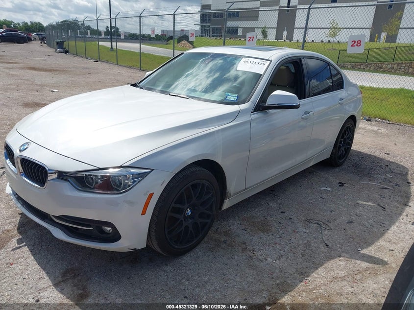 2018 BMW 3er VIN WBA8B9C52JK677093 IAAI salvage auction — WATER/FLOOD, Salvage (Texas), sold $2,775 on 2026-07-28 (photo 2)