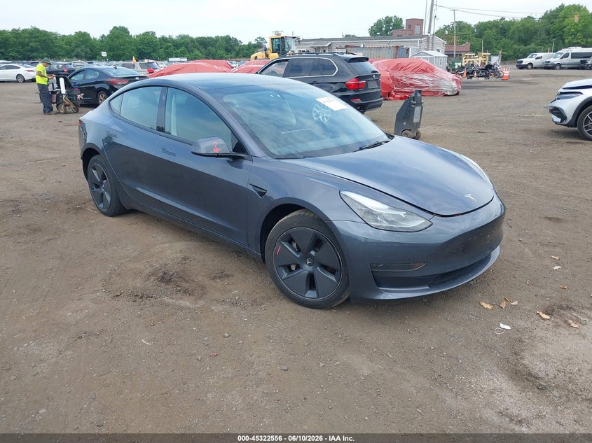 2023 Tesla Model 3 VIN 5YJ3E1EA6PF658794 — IAAI salvage auction photo