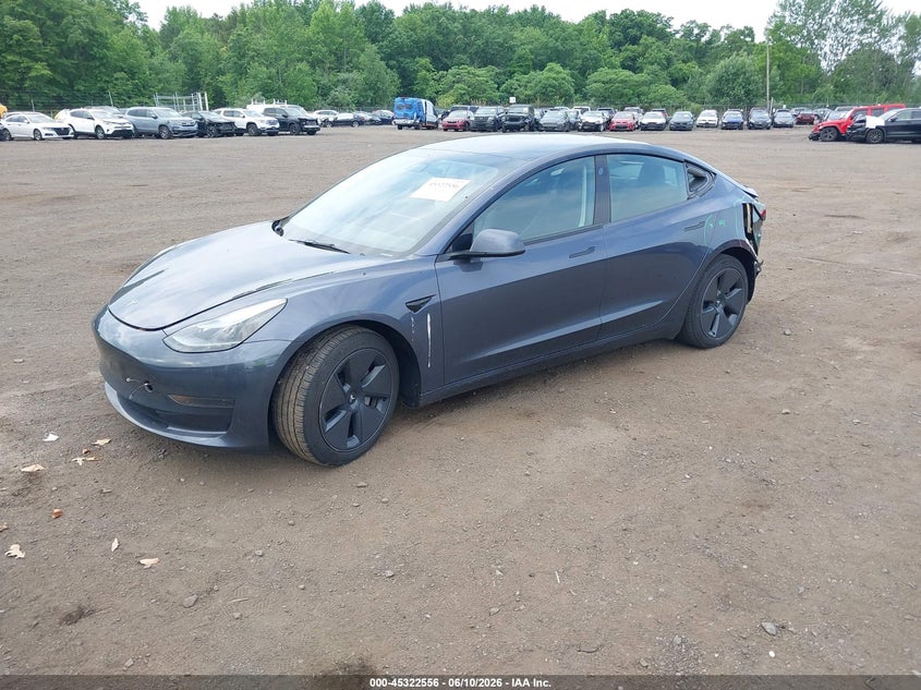 2023 Tesla Model 3 VIN 5YJ3E1EA6PF658794 IAAI salvage auction — REAR END, Wait Title, sold $8,300 on 2026-08-23 (photo 2)