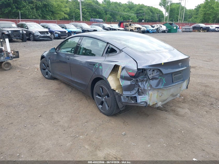 2023 Tesla Model 3 VIN 5YJ3E1EA6PF658794 IAAI salvage auction — REAR END, Wait Title, sold $8,300 on 2026-08-23 (photo 3)