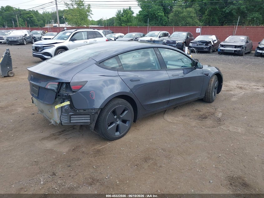 2023 Tesla Model 3 VIN 5YJ3E1EA6PF658794 IAAI salvage auction — REAR END, Wait Title, sold $8,300 on 2026-08-23 (photo 4)