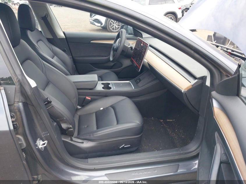 2023 Tesla Model 3 VIN 5YJ3E1EA6PF658794 IAAI salvage auction — REAR END, Wait Title, sold $8,300 on 2026-08-23 (photo 5)