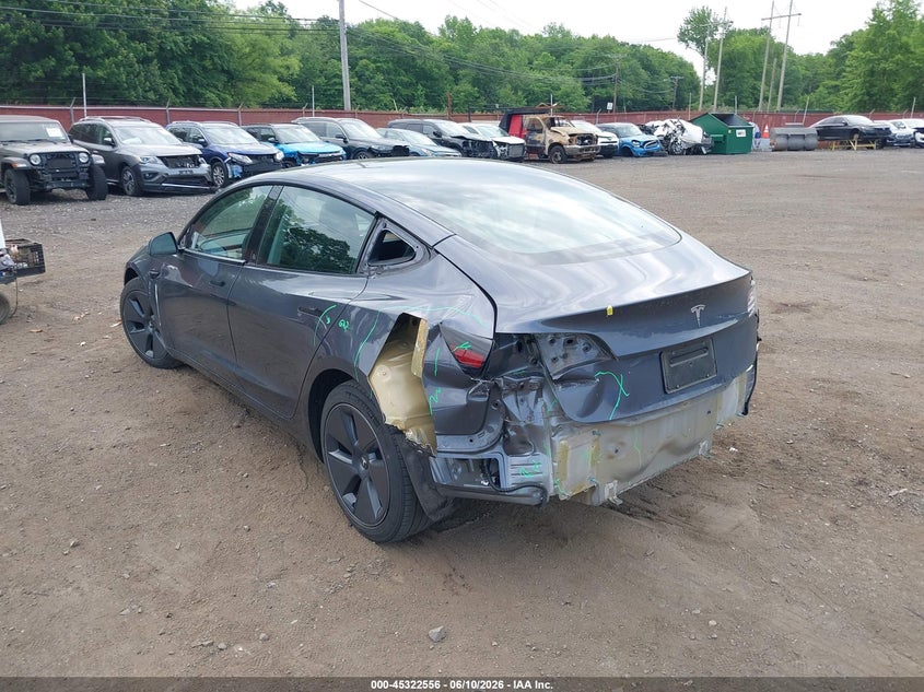 2023 Tesla Model 3 VIN 5YJ3E1EA6PF658794 IAAI salvage auction — REAR END, Wait Title, sold $8,300 on 2026-08-23 (photo 6)