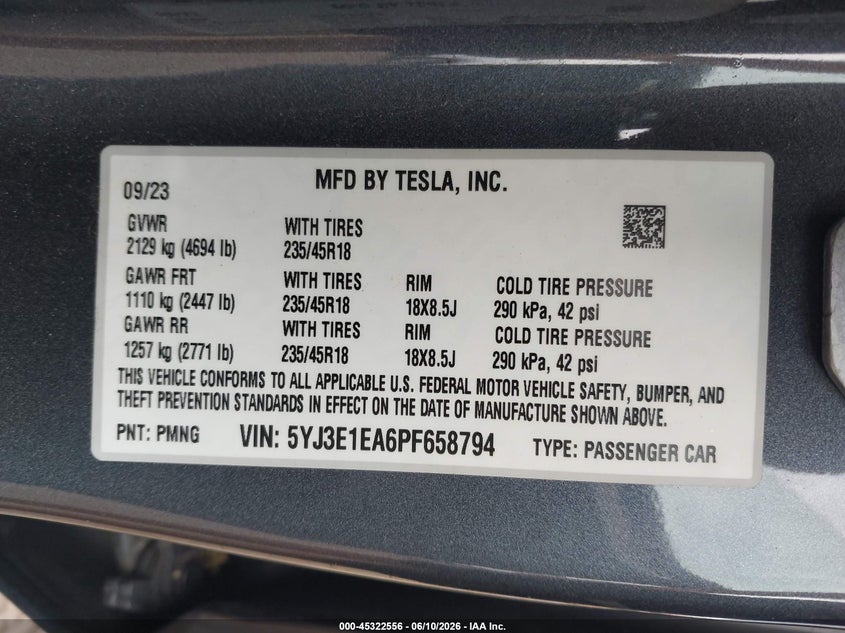 2023 Tesla Model 3 VIN 5YJ3E1EA6PF658794 IAAI salvage auction — REAR END, Wait Title, sold $8,300 on 2026-08-23 (photo 9)