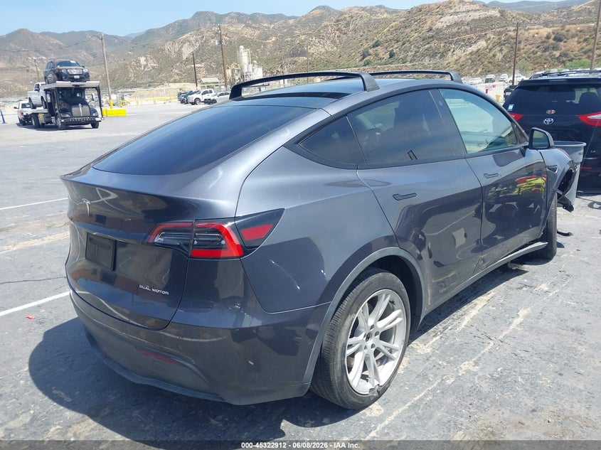 2021 Tesla Model y VIN 5YJYGDEE4MF082218 IAAI salvage auction — RIGHT FRONT, Salvage Title, sold $7,500 on 2026-07-23 (photo 4)