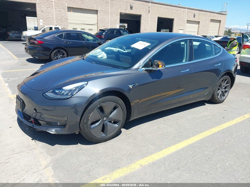 2018 Tesla Model 3 VIN 5YJ3E1EAXJF045309 IAAI salvage auction — RIGHT FRONT, Salvage (California), sold $25 on 2026-07-29 (photo 2)