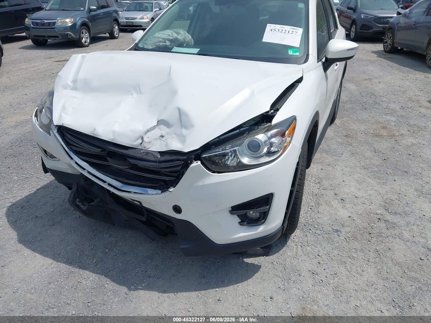 2016 Mazda Cx-5 VIN JM3KE4CY5G0900820 IAAI salvage auction — FRONT END, Salvage Title, sold $1,450 on 2026-07-10 (photo 6)