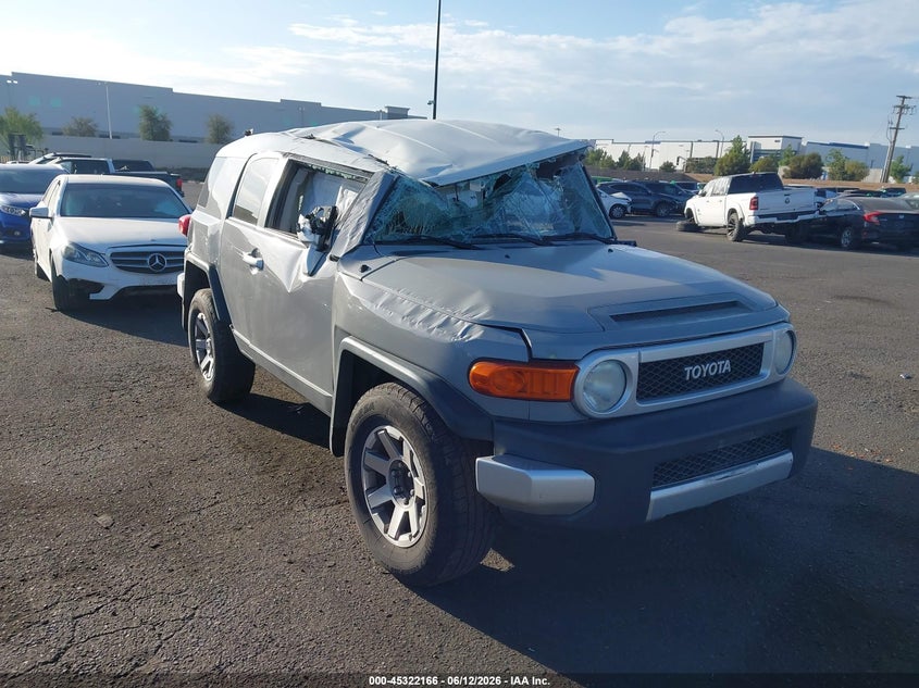 2014 Toyota Fj cruiser VIN JTEZU4BFXEK013785 IAAI salvage auction — ROLLOVER, Salvage Title, sold $5,500 on 2026-08-14 (photo 1)