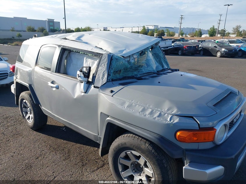 2014 Toyota Fj cruiser VIN JTEZU4BFXEK013785 IAAI salvage auction — ROLLOVER, Salvage Title, sold $5,500 on 2026-08-14 (photo 6)