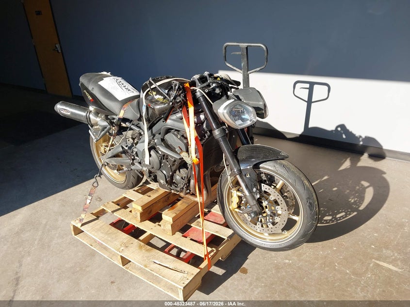 2012 Triumph motorcycle Street VIN SMTD02NE5CT531541 IAAI salvage auction — ROLLOVER, Clear (Virginia), sold $575 on 2026-07-07 (photo 1)
