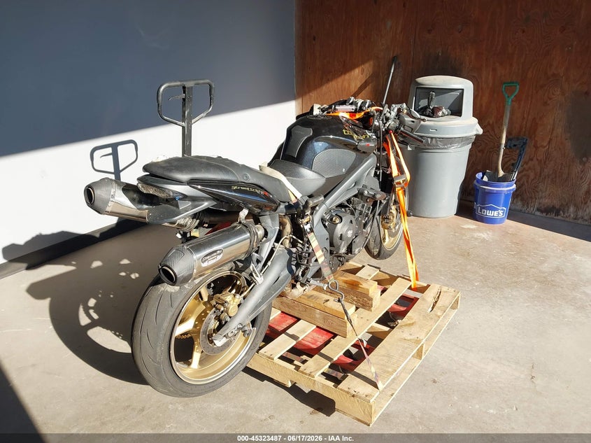 2012 Triumph motorcycle Street VIN SMTD02NE5CT531541 IAAI salvage auction — ROLLOVER, Clear (Virginia), sold $575 on 2026-07-07 (photo 4)