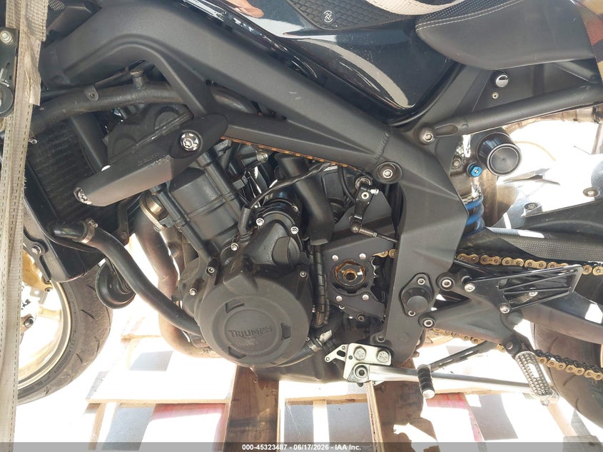 2012 Triumph motorcycle Street VIN SMTD02NE5CT531541 IAAI salvage auction — ROLLOVER, Clear (Virginia), sold $575 on 2026-07-07 (photo 9)