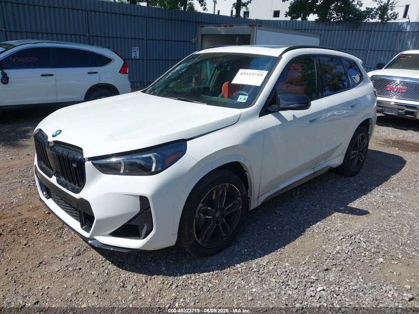 2025 BMW X1 VIN WBX13EF08S5341820 IAAI salvage auction — SIDE, Salvage Title, sold $12,700 on 2026-07-15 (photo 2)