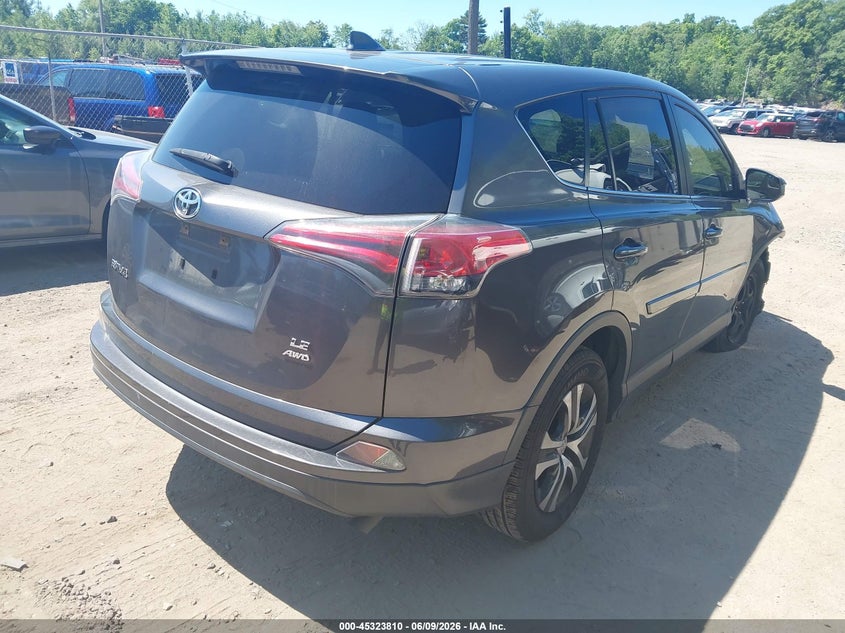 2018 Toyota Rav 4 VIN JTMBFREV3JJ248934 IAAI salvage auction — RIGHT FRONT, Salvage Title, sold $5,700 on 2026-07-07 (photo 4)
