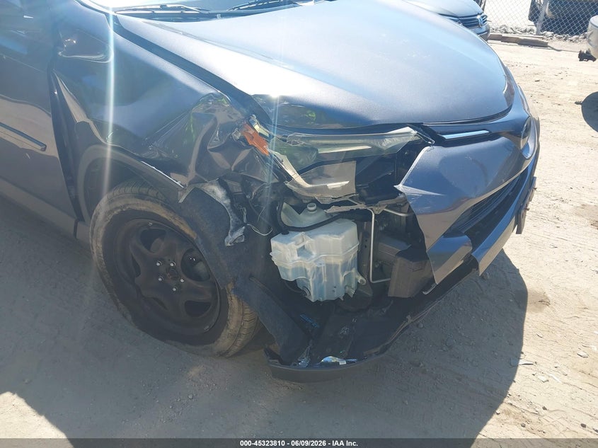 2018 Toyota Rav 4 VIN JTMBFREV3JJ248934 IAAI salvage auction — RIGHT FRONT, Salvage Title, sold $5,700 on 2026-07-07 (photo 6)