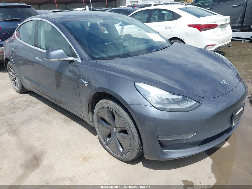 2018 Tesla Model 3 VIN 5YJ3E1EA2JF158221 IAAI salvage auction — LEFT REAR, Original (Texas), sold $4,225 on 2026-07-23 (photo 1)