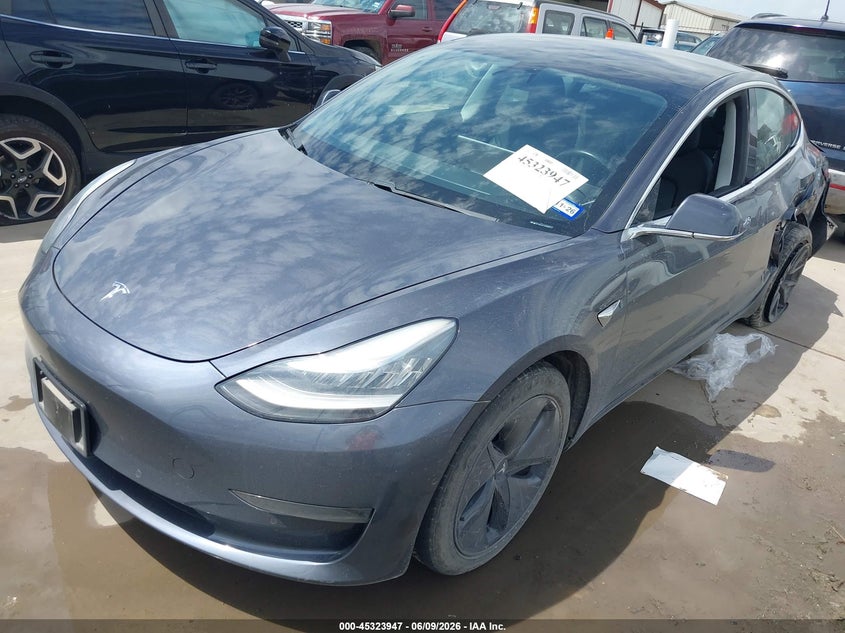 2018 Tesla Model 3 VIN 5YJ3E1EA2JF158221 IAAI salvage auction — LEFT REAR, Original (Texas), sold $4,225 on 2026-07-23 (photo 2)