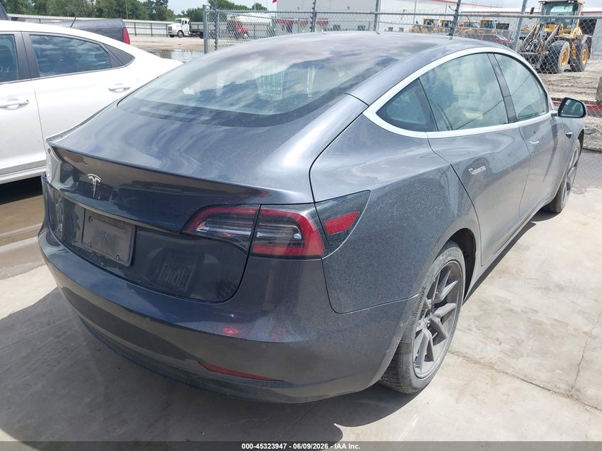 2018 Tesla Model 3 VIN 5YJ3E1EA2JF158221 IAAI salvage auction — LEFT REAR, Original (Texas), sold $4,225 on 2026-07-23 (photo 4)