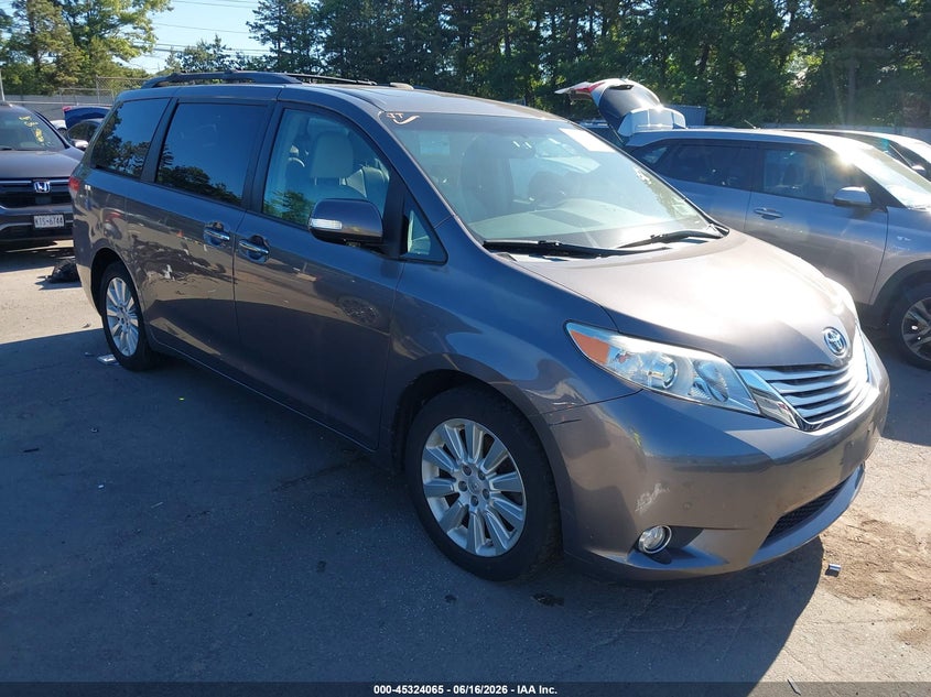 2014 Toyota Sienna VIN 5TDDK3DC1ES085145 IAAI salvage auction — SIDE, Salvage Title, sold $4,050 on 2026-07-17 (photo 1)