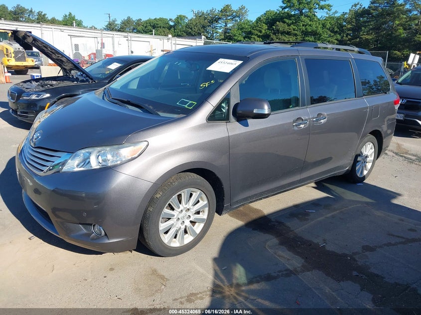 2014 Toyota Sienna VIN 5TDDK3DC1ES085145 IAAI salvage auction — SIDE, Salvage Title, sold $4,050 on 2026-07-17 (photo 2)