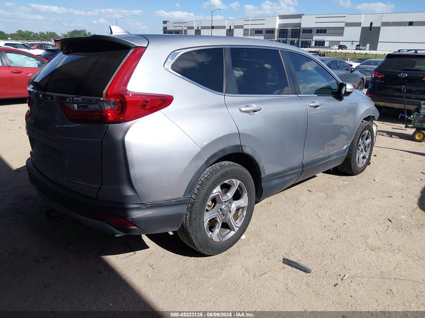 2019 Honda Cr-v VIN 7FARW1H53KE039038 IAAI salvage auction — SIDE, Salvage Title, sold $5,850 on 2026-07-21 (photo 4)