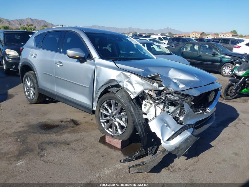 2021 Mazda Cx-5 VIN JM3KFBAY5M0381770 IAAI salvage auction — RIGHT FRONT, Salvage Title, sold $6,400 on 2026-07-07 (photo 1)