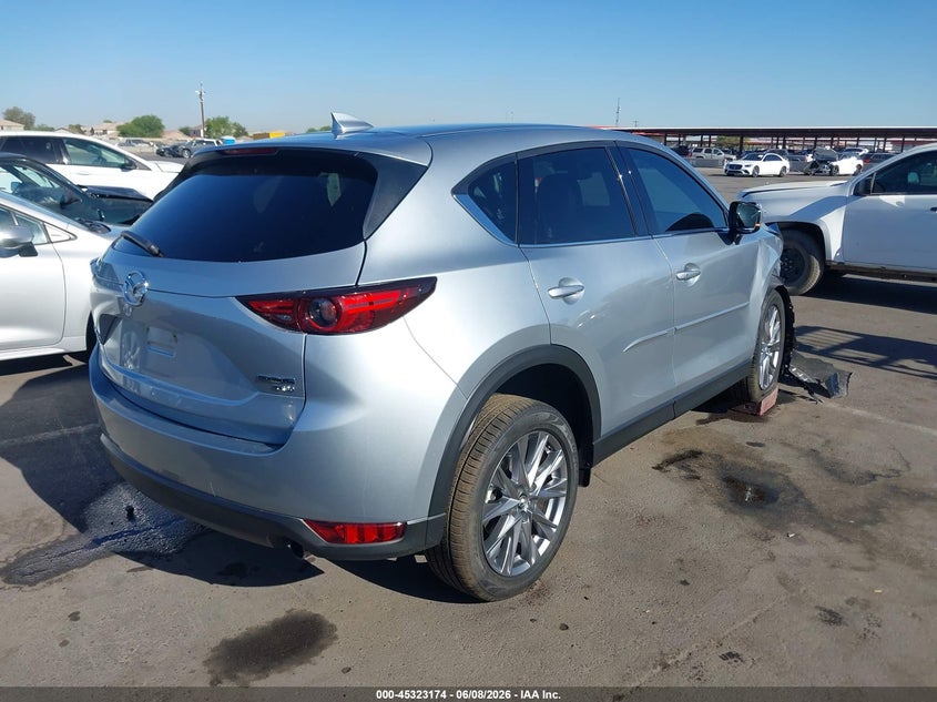 2021 Mazda Cx-5 VIN JM3KFBAY5M0381770 IAAI salvage auction — RIGHT FRONT, Salvage Title, sold $6,400 on 2026-07-07 (photo 4)