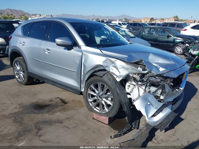 2021 Mazda Cx-5 VIN JM3KFBAY5M0381770 IAAI salvage auction — RIGHT FRONT, Salvage Title, sold $6,400 on 2026-07-07 (photo 6)