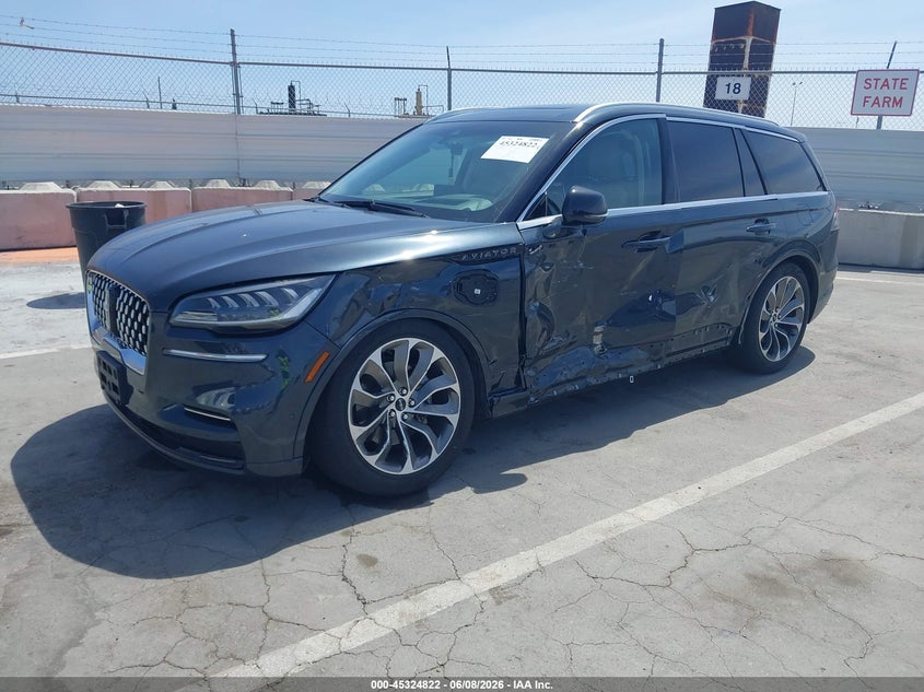 2023 Lincoln Aviator VIN 5LMYJ8XY5PNL01203 IAAI salvage auction — SIDE, Salvage (California), sold $17,975 on 2026-07-15 (photo 2)