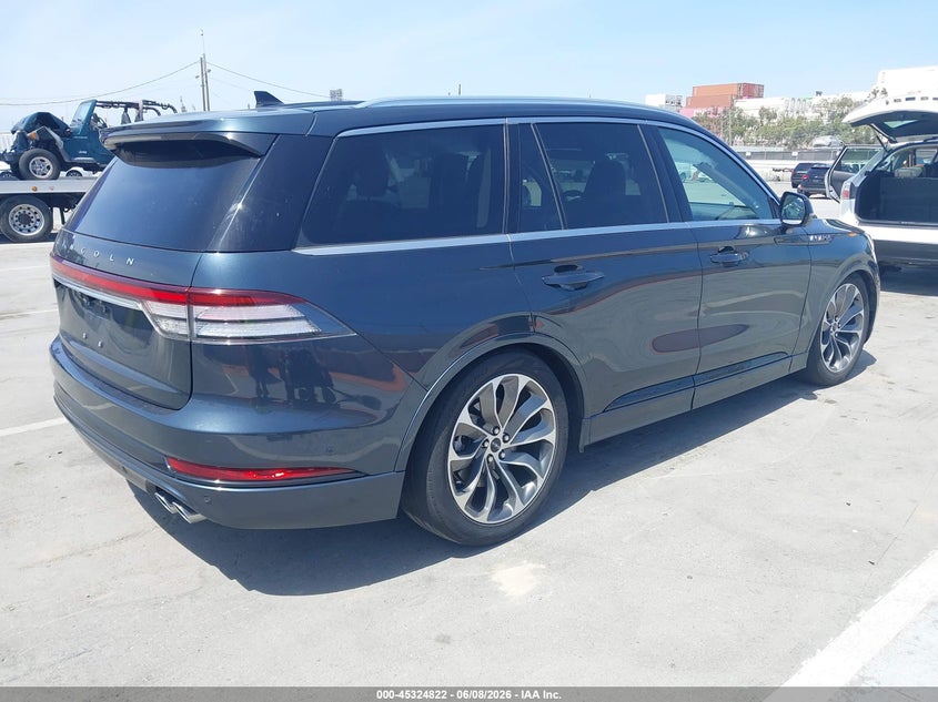 2023 Lincoln Aviator VIN 5LMYJ8XY5PNL01203 IAAI salvage auction — SIDE, Salvage (California), sold $17,975 on 2026-07-15 (photo 4)