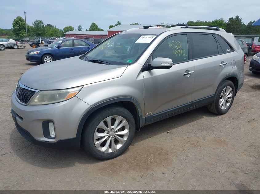 2015 Kia Sorento VIN 5XYKUDA75FG611872 IAAI salvage auction — NORMAL WEAR, Salvage Title, sold $850 on 2026-07-21 (photo 2)
