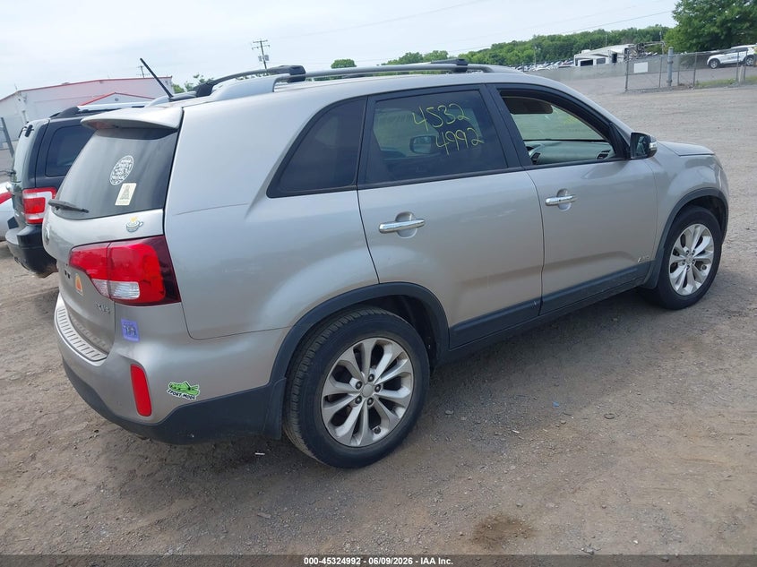 2015 Kia Sorento VIN 5XYKUDA75FG611872 IAAI salvage auction — NORMAL WEAR, Salvage Title, sold $850 on 2026-07-21 (photo 4)