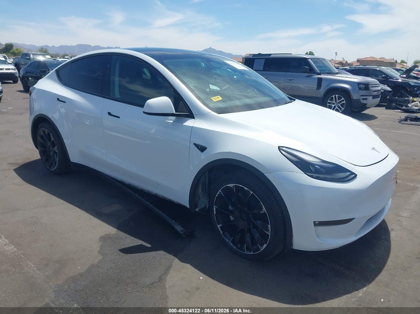 2023 Tesla Model y VIN 7SAYGDEEXPF791033 IAAI salvage auction — LEFT FRONT, Salvage (Arizona), sold $11,000 on 2026-07-21 (photo 1)
