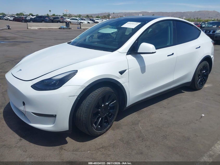 2023 Tesla Model y VIN 7SAYGDEEXPF791033 IAAI salvage auction — LEFT FRONT, Salvage (Arizona), sold $11,000 on 2026-07-21 (photo 2)