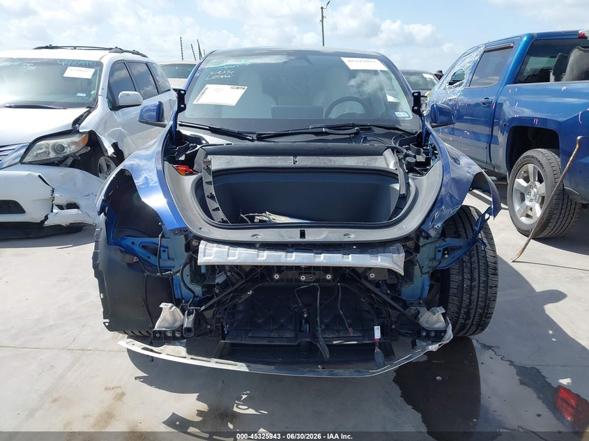 2023 Tesla Model y VIN 7SAYGAEE3PF968570 IAAI salvage auction — FRONT END, Salvage (Texas), sold $12,100 on 2026-07-13 (photo 6)
