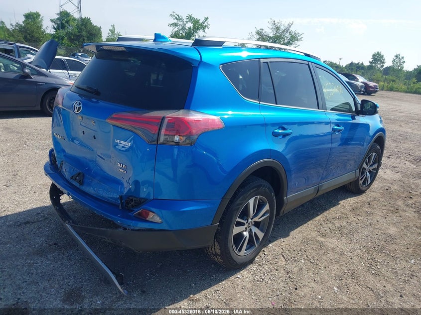 2017 Toyota Rav 4 VIN JTMRFREV9HJ141721 IAAI salvage auction — REAR END, Clear (Wisconsin), sold $6,900 on 2026-07-28 (photo 4)