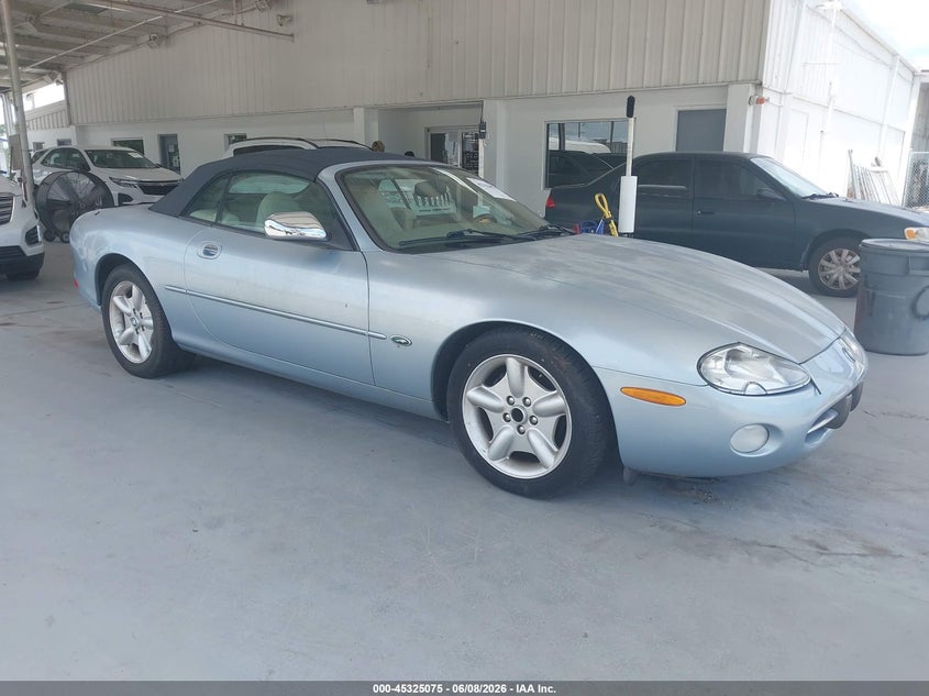 1997 Jaguar Xk series VIN SAJGX2749VC013559 IAAI salvage auction — NORMAL WEAR, Rebuildable (Florida), sold $1,100 on 2026-07-08 (photo 1)
