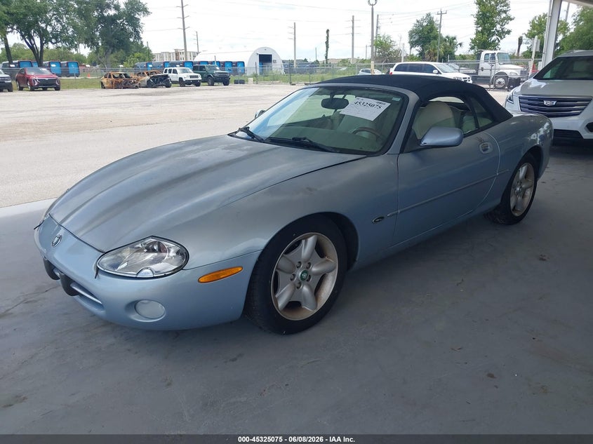 1997 Jaguar Xk series VIN SAJGX2749VC013559 IAAI salvage auction — NORMAL WEAR, Rebuildable (Florida), sold $1,100 on 2026-07-08 (photo 2)