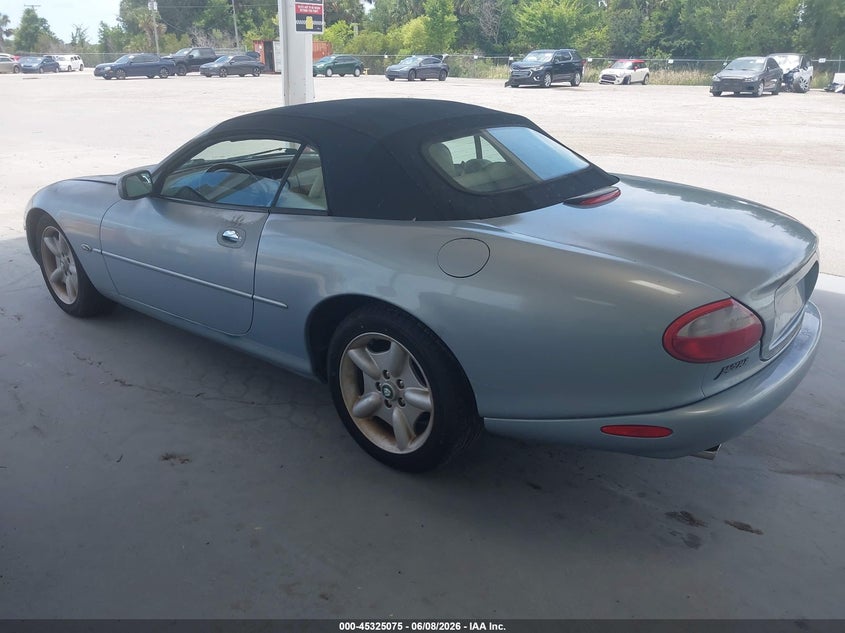 1997 Jaguar Xk series VIN SAJGX2749VC013559 IAAI salvage auction — NORMAL WEAR, Rebuildable (Florida), sold $1,100 on 2026-07-08 (photo 3)