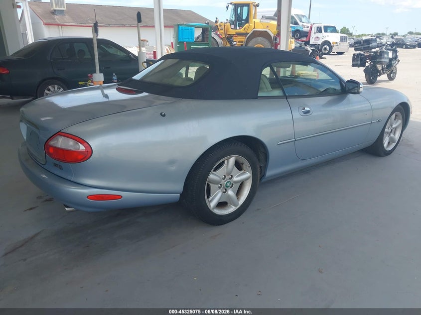 1997 Jaguar Xk series VIN SAJGX2749VC013559 IAAI salvage auction — NORMAL WEAR, Rebuildable (Florida), sold $1,100 on 2026-07-08 (photo 4)