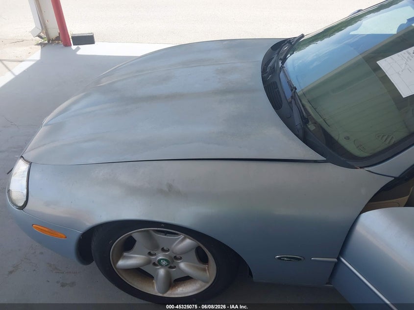 1997 Jaguar Xk series VIN SAJGX2749VC013559 IAAI salvage auction — NORMAL WEAR, Rebuildable (Florida), sold $1,100 on 2026-07-08 (photo 6)