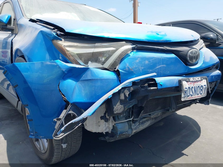 2018 Toyota Rav 4 VIN JTMYFREV9JJ725957 IAAI salvage auction — RIGHT FRONT, Salvage Certificate (California), sold $4,650 on 2026-07-15 (photo 6)