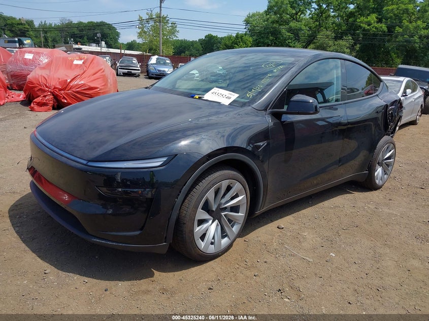 2026 Tesla Model y VIN 7SAYGDEE6TF553805 IAAI salvage auction — REAR END, Salvage (Idaho), sold $15,800 on 2026-07-29 (photo 2)