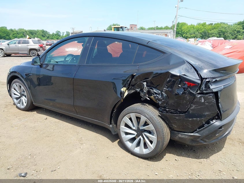 2026 Tesla Model y VIN 7SAYGDEE6TF553805 IAAI salvage auction — REAR END, Salvage (Idaho), sold $15,800 on 2026-07-29 (photo 6)