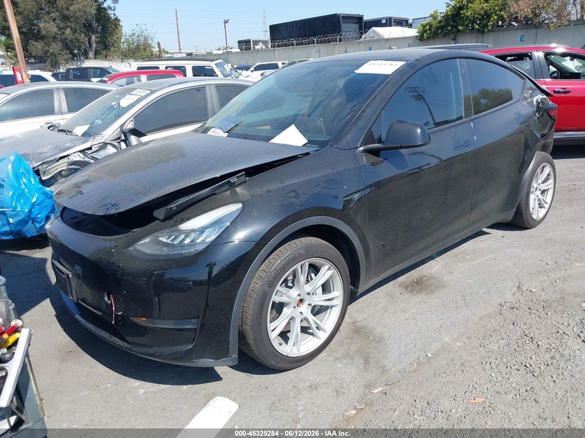 2023 Tesla Model y VIN 7SAYGDEE7PA125907 IAAI salvage auction — LEFT REAR, Salvage Title, sold $7,900 on 2026-07-08 (photo 2)