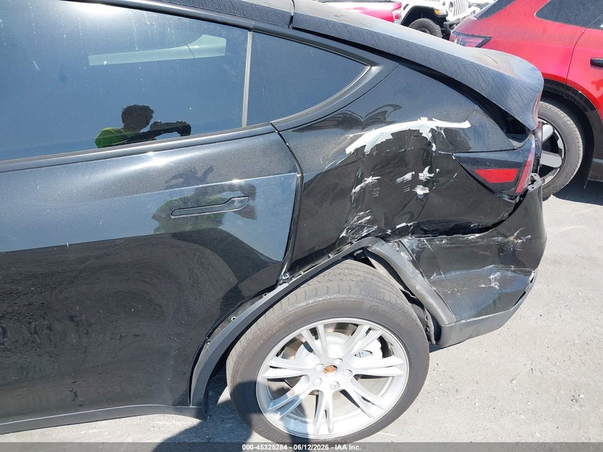 2023 Tesla Model y VIN 7SAYGDEE7PA125907 IAAI salvage auction — LEFT REAR, Salvage Title, sold $7,900 on 2026-07-08 (photo 6)