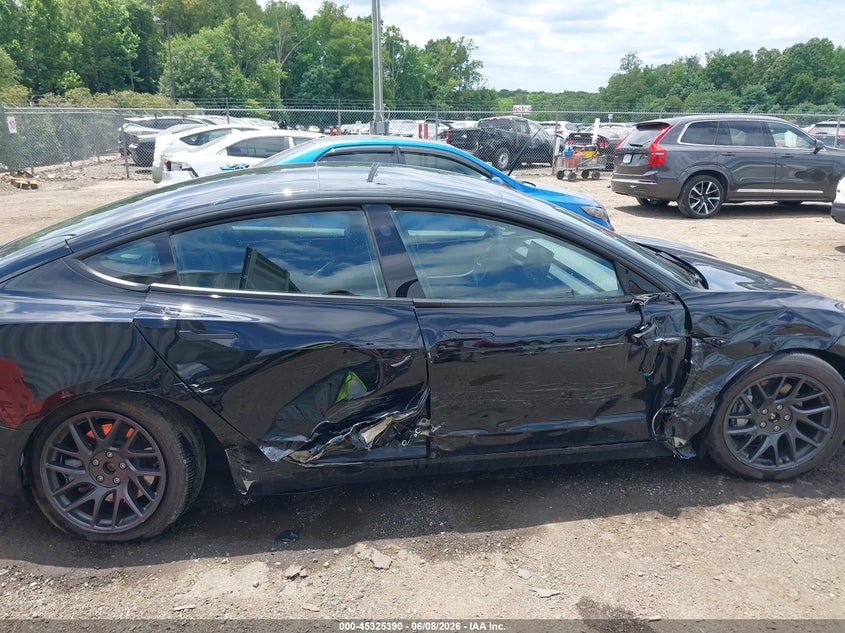2025 Tesla Model 3 VIN 5YJ3E1EB9SF906618 IAAI salvage auction — SIDE, Salvage Title, sold $12,700 on 2026-07-20 (photo 6)