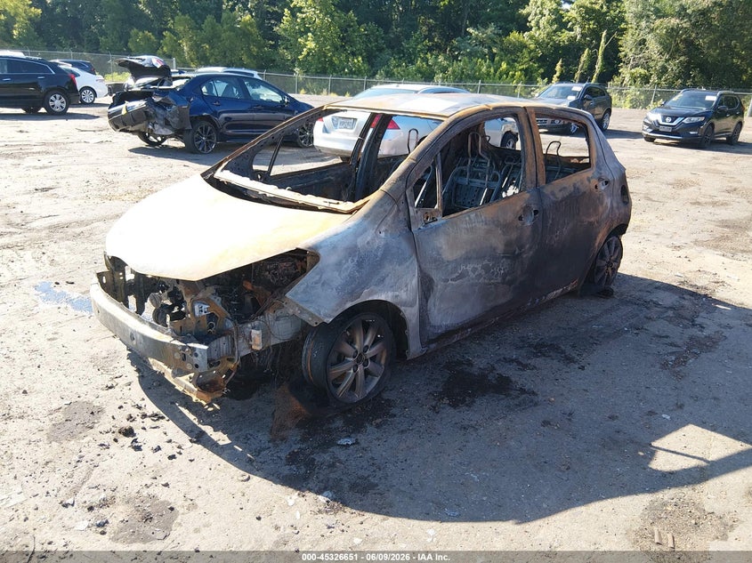 2015 Toyota Yaris VIN VNKKTUD35FA039575 IAAI salvage auction — TOTAL BURN, Salvage Title, sold $75 on 2026-07-15 (photo 2)